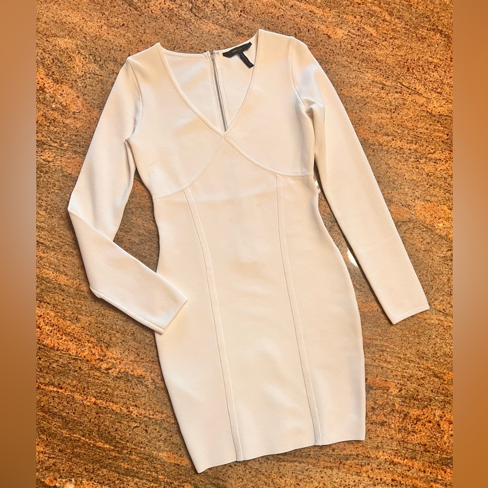 BCBG MaxAzria bandage dress. Size m low v cut.   Dress hits just above the knee